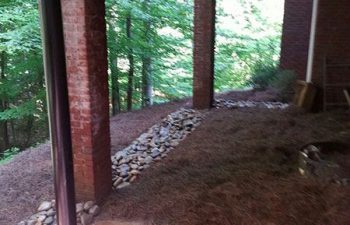 dry creek bed installed by Pannone’s Lawn Pros & Landscaping