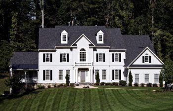 house with manicured lawn maintained by Pannone’s Lawn Pros & Landscaping