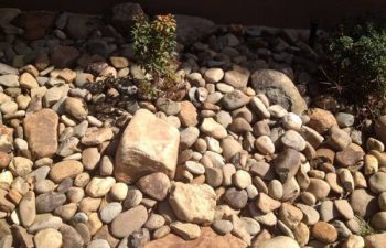 dry creek bed installed by Pannone’s Lawn Pros & Landscaping