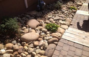 dry creek bed installed by Pannone’s Lawn Pros & Landscaping