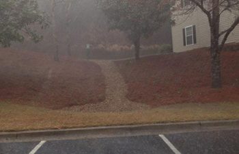 dry creek bed installed by Pannone’s Lawn Pros & Landscaping