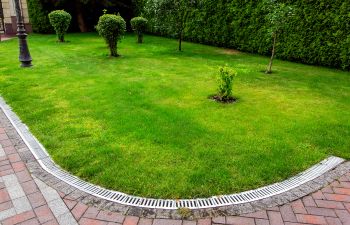 Iron grid around front yard lawn.